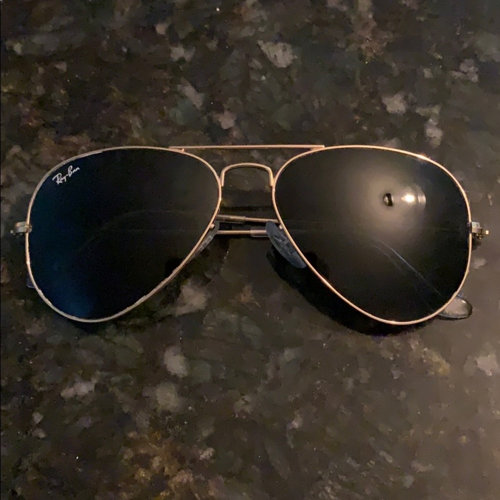 Black and gold Ray-Ban Aviators